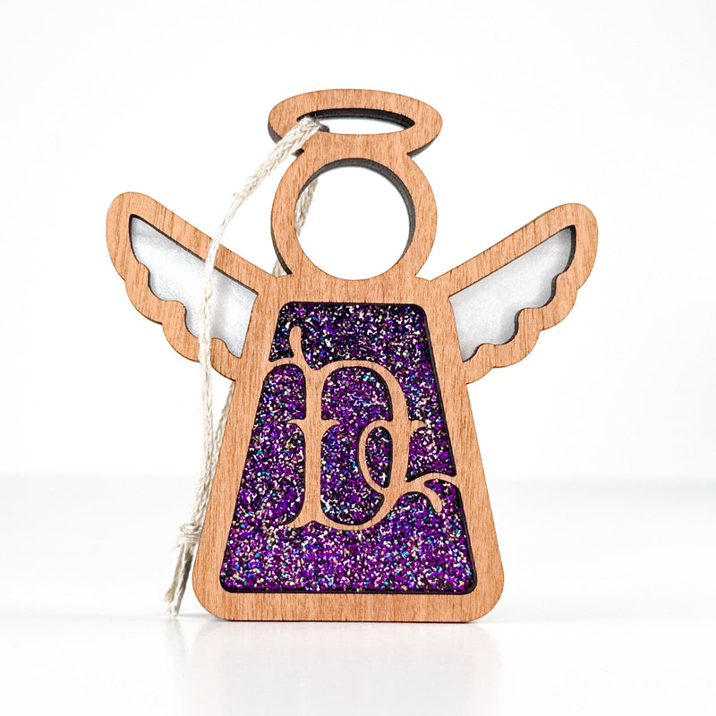 Front view of a glittery purple letter D monogram angel - a custom initial ornament for mom’s holiday collection