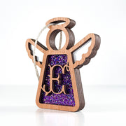 Side view of a purple sparkle E monogram ornament, displaying its handcrafted Texas elegance for year-round display