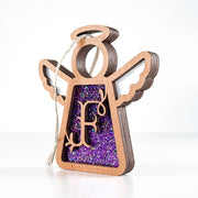 Side view of a purple glitter F initial ornament, showing off its layered beauty as a thoughtful gift idea