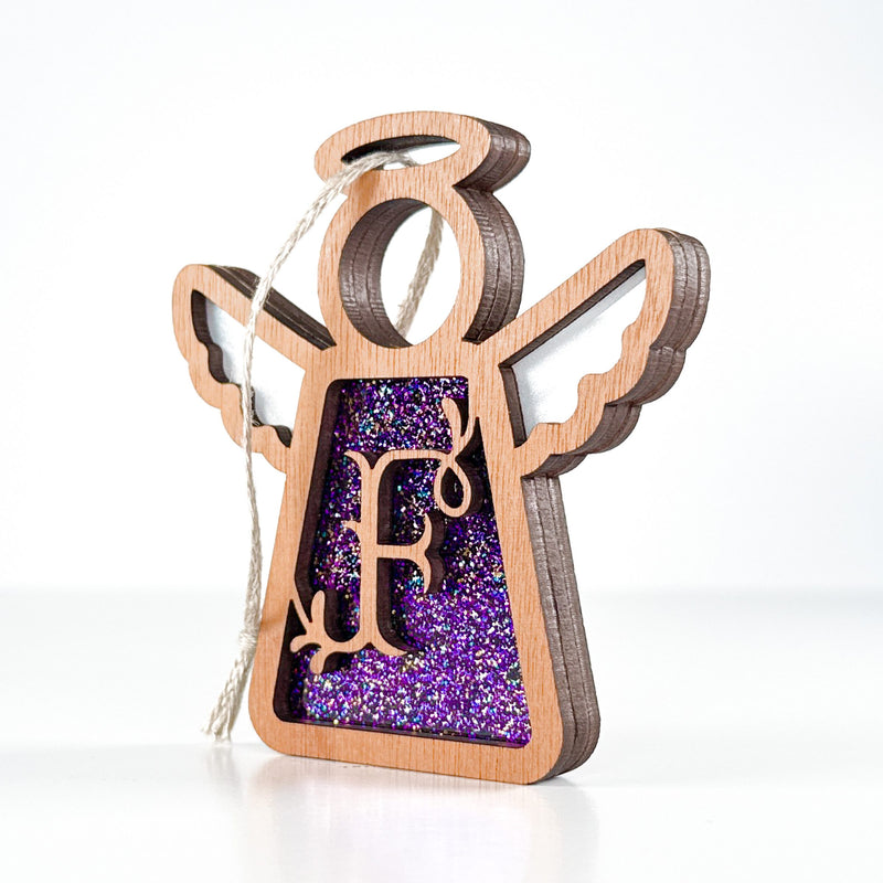 Side view of a purple glitter F initial ornament, showing off its layered beauty as a thoughtful gift idea