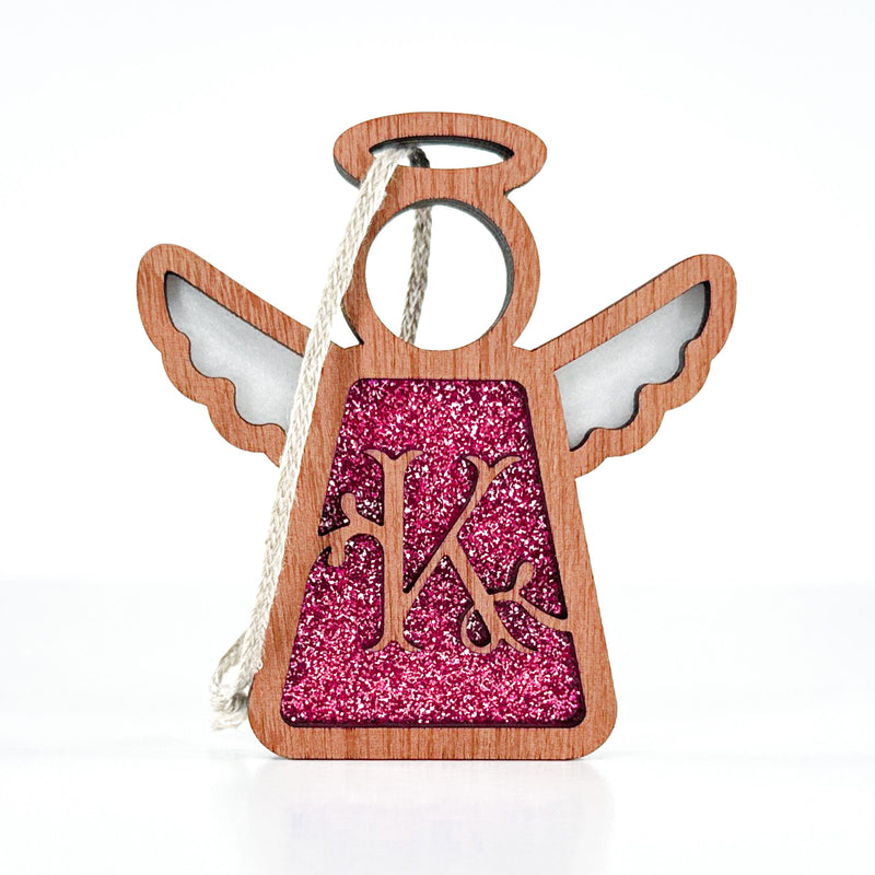 The Forged Flare® Mother's Angels® 3.5" angel figurine ornament features a pink glittery "K" monogram, outlined wings and halo, and a twine loop for hanging—a charming personalized Christmas decoration.