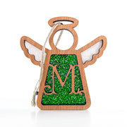 The Forged Flare® Mother's Angels® 3.5" Personalized M Monogram Ornament features a wooden angel with wings, halo, green glitter center, and hanging string—perfect as a custom Christmas decoration.
