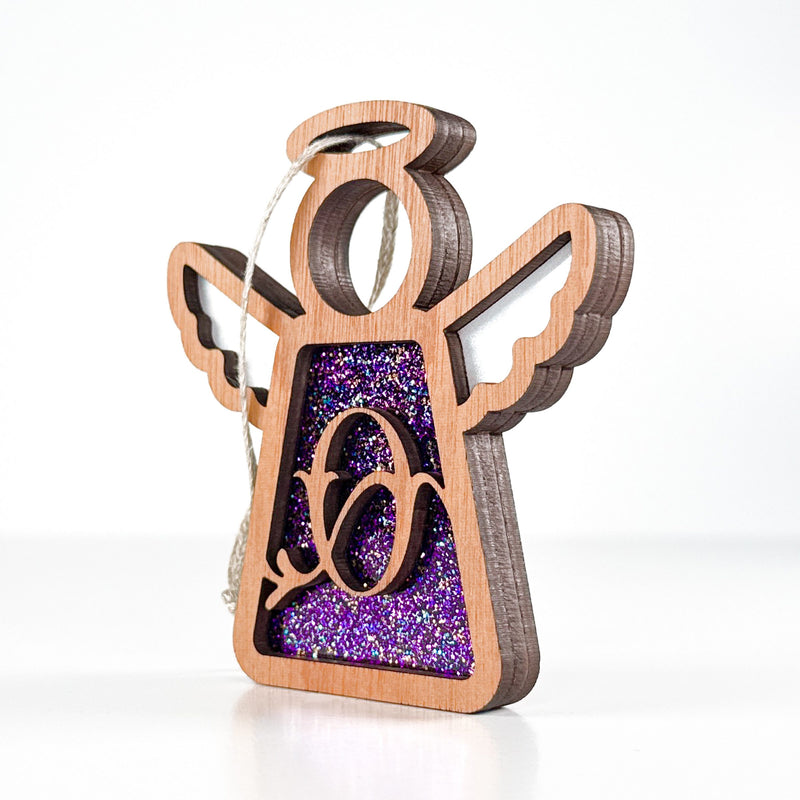 Side view of a purple O monogram ornament, highlighting its Texas-crafted depth for personalized gift ideas