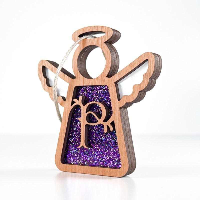 Side view of a purple sparkle P initial ornament, revealing its handmade layers for Christmas or everyday use