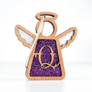 Front view of a purple glitter letter Q angel ornament - a thoughtful monogram Christmas gift for loved ones