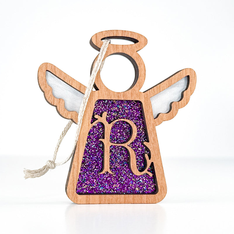 Front view of a handcrafted letter R monogram angel in purple sparkle - perfect personalized gift for mom