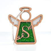 The Forged Flare® Personalized S Monogram Ornament is a 3.5" wooden Mother's Angels® figurine with a green glittery center and large cursive "S," featuring an attached string for easy hanging.
