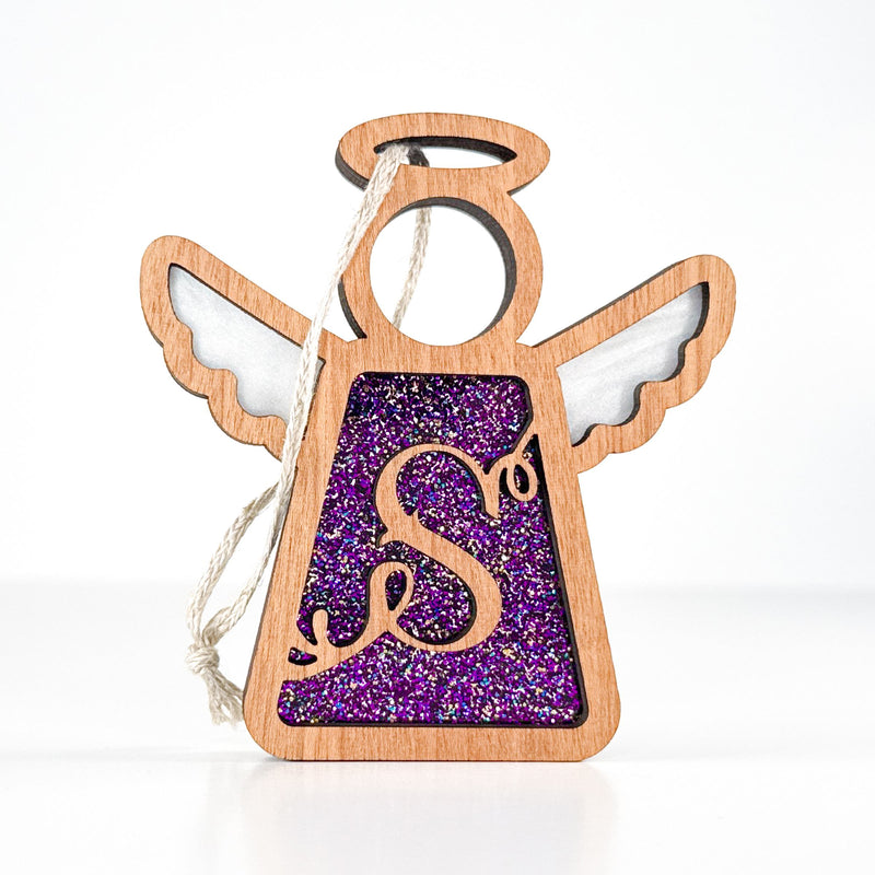 Front view of a purple sparkle letter S angel ornament - a custom monogram gift for her special moments