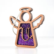 Side view of a purple U monogram ornament, showcasing its handcrafted Texas elegance for keepsake display