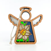 The Forged Flare® Narcissus Ornament is a 3.5" Mother's Angels® angel figurine with halo and wings, showcasing a stained glass-style December narcissus flower on green and blue, and includes a hanging string.