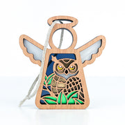 The Forged Flare® Owl Ornament | 3.5" (H) Angel Figurine from Mother's Angels® features an owl with outstretched wings in green, yellow, and blue, complete with a hanging string—a charming gift for bird lovers.