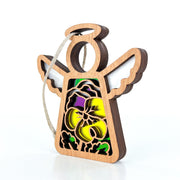 The Forged Flare® Pansy Ornament is a 3.5" Mother's Angels® wooden angel with yellow and purple stained-glass effect and cut-out details, perfect for hanging on your Christmas tree or adding to your angel figurines collection.