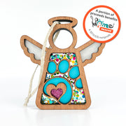 The Forged Flare® Paw Print for Charity Ornament (3.5" angel) features blue paw prints, a pink glitter heart, and colorful dots. Proceeds benefit Home Rescue 501(c)(3). A thoughtful pet loss or memorial gift from Mother's Angels®.