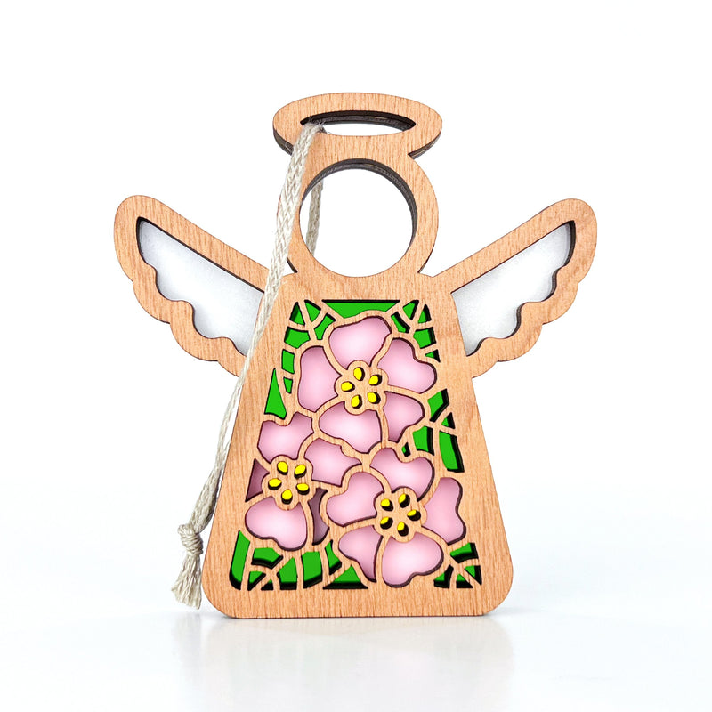 The Forged Flare® Mother's Angels® Pink Evening Primrose Ornament is a 3.5" wooden angel figurine with stained glass-style wings and primrose flowers, accented with green leaves and a looped white string for hanging.