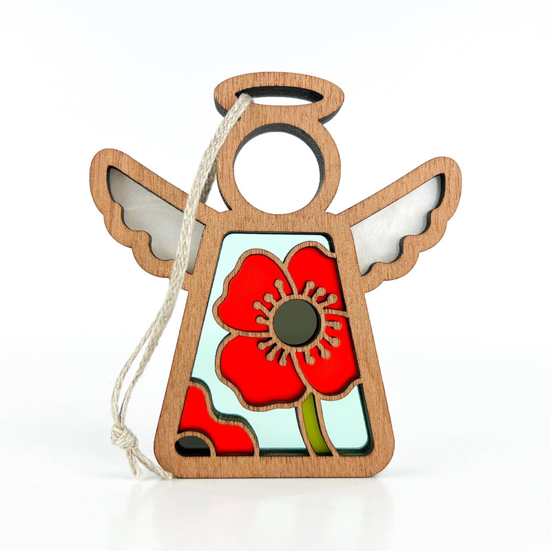 The Forged Flare® Mother's Angels® 3.5" Poppy Ornament is a wooden angel figurine with stained glass wings and a red poppy design, perfect for gifting or your Amazon finds. Includes hanging string; photographed on a white background.