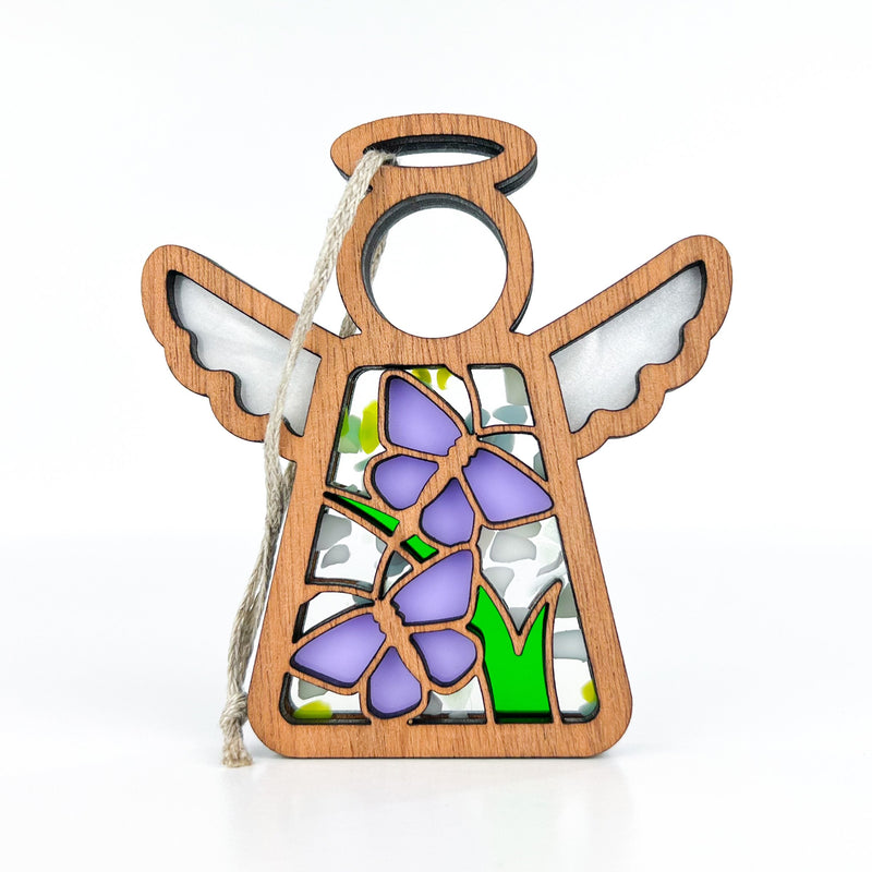 The Forged Flare® Mother’s Angels® Playful Purple Butterflies Ornament is a 3.5" tall angel figurine with stained-glass style purple butterflies and a hanging loop, available as a warehouse return on Amazon.