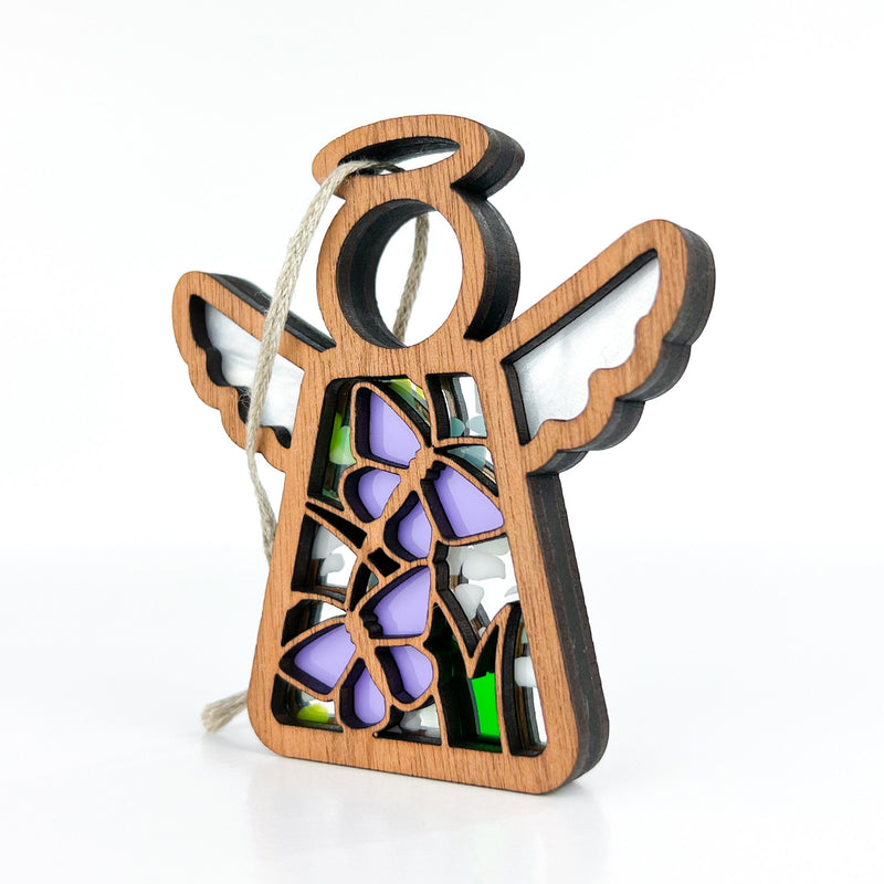 The Forged Flare® Warehouse Return - Playful Purple Butterflies Ornament is a 3.5" Mother’s Angels® figurine with stained glass wings and twine loop—great for gifting or reselling on Amazon.