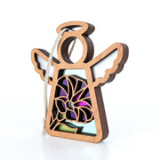 The Purple Morning Glory Ornament by Forged Flare® is a 3.5" wooden angel figurine with cut-out wings, vibrant stained glass accents, and a hanging string—an ideal birth flower keepsake from the Mother's Angels® collection.