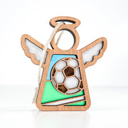 The Forged Flare® Mother's Angels® Soccer Ornament is a 3.5" wooden angel figurine with a soccer ball, green-blue accents, cut-out wings, halo, and hanging string—an ideal soccer lover gift.