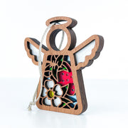 The Forged Flare® Strawberry Ornament is a 3.5" (H) Mother's Angels® wooden angel figurine with white wings, floral cutouts, red interior, and a string for hanging—ideal as a charming Christmas tree ornament on any surface.