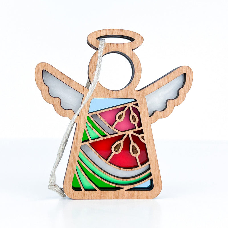 The Summer Watermelon Ornament by Forged Flare® is a 3.5" angel figurine from Mother's Angels®, featuring stained glass-style red, green, and blue accents, a hollow head, wings, and a white hanging string for easy display.