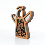 The Forged Flare® Texas Bluebonnet Ornament is a 3.5" Mother's Angels® figurine with cut-out wings and floral details, featuring a white hanging loop and standing upright—ideal as flower decor.