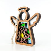 The Forged Flare® Water Lily Ornament is a 3.5" wooden Mother's Angels® angel figurine with layered wings, halo, string for hanging, and stained glass-like details featuring a water lily birth flower motif with yellow center.