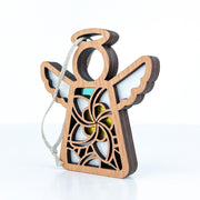 The Forged Flare® White Plumeria Ornament is a 3.5" Mother's Angels® wooden angel figurine with laser-cut patterns, colored accents, and a hanging loop, shown on a white background.