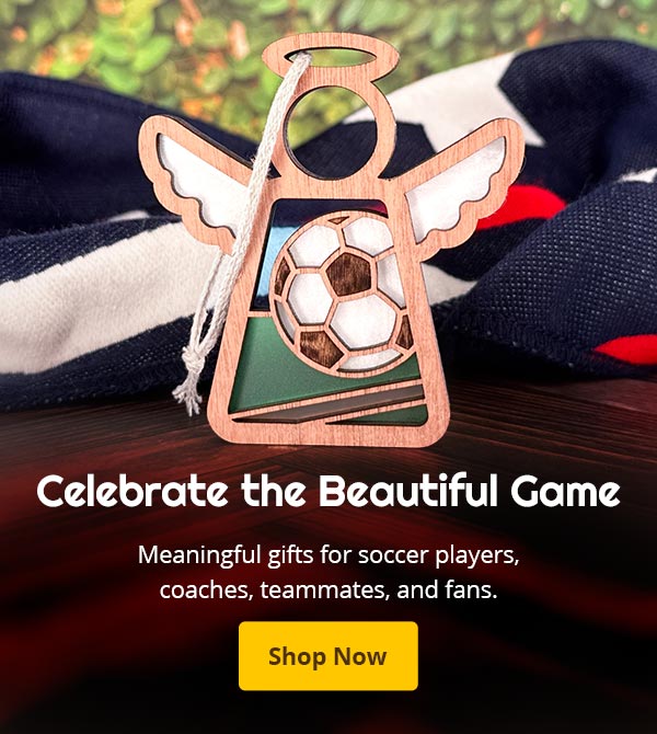 Wooden angel ornament with soccer ball design on a blurred sports-themed background, with text that reads: Celebrate the Beautiful Game
Meaningful gifts for soccer players, coaches, teammates, and fans. Shop Now