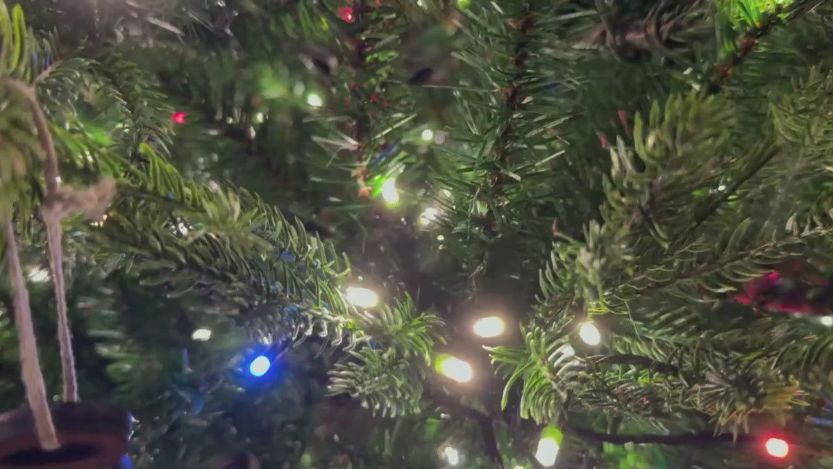 Christmas tree adorned with various Mother’s Angels® ornaments.