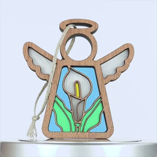 A 360-degree view of a white calla lily ornament, showcasing its intricate design and perfect for Christmas tree decoration or flower decor.