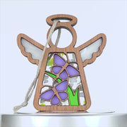 A wooden angel ornament with a rope loop for hanging. The center of the ornament features a cut-out design with two purple butterflies and green leaves against a white and gray background. The angel has a round head, halo, and wings.