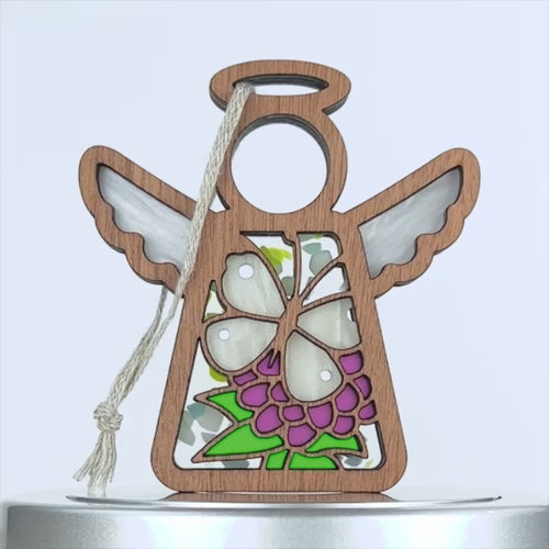 A 360-degree view of an angel ornament showcasing a detailed cabbage white butterfly, perfect for butterfly gifts and decorations.